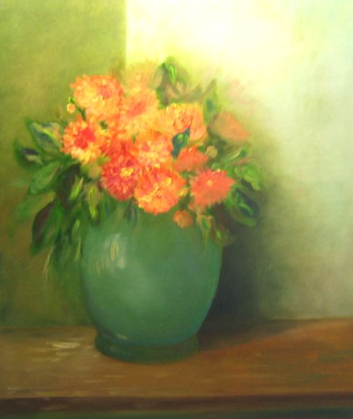pot vert fleurs oranges