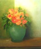 pot vert fleurs oranges